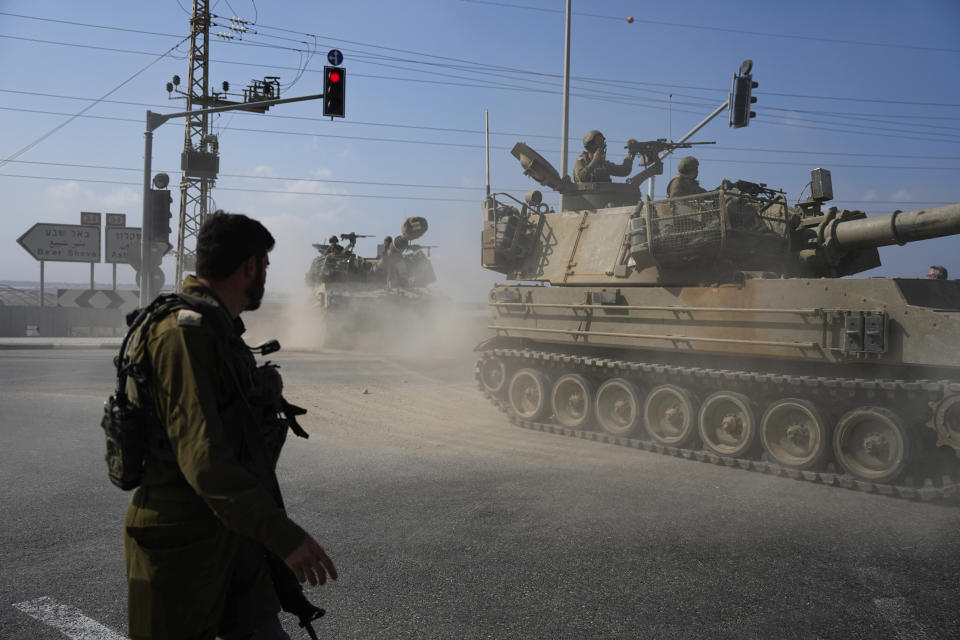 Israeli army tanks move towards the Gaza Strip border in southern Israel Wednesday, Nov.1, 2023. Israeli ground forces have been operating in Gaza in recent days as Israel presses ahead with its war against Hamas militants. (AP Photo/Ariel Schalit)