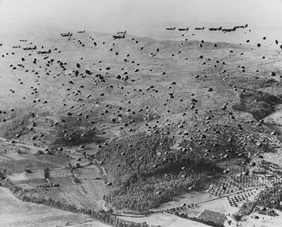 Hundreds of American paratroopers drop into Normandy, France, on or near D-Day, June 6, 1944. Their landing, part of an all-out Allied assault from air and sea, was the beginning of a sweep through Europe that would finally defeat Nazi Germany. (Photo: Hulton-Deutsch Collection/Corbis via Getty Images)