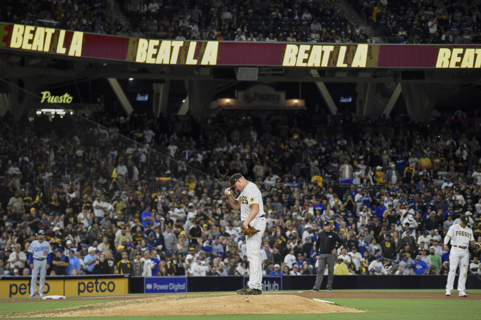 San Diego Padres relief pitcher Mark Melancon (33) stands on the mound between pitches during the ninth inning of a baseball game against the Los Angeles Dodgers Tuesday, June 22, 2021, in San Diego. The Padres won 3-2. (AP Photo/Denis Poroy)