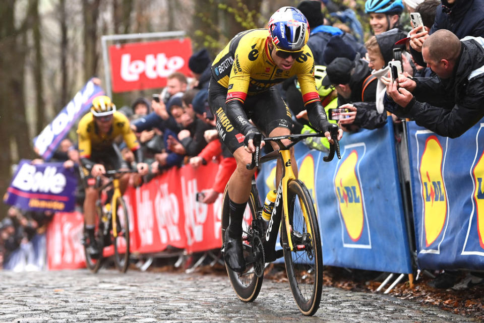 WEVELGEM BELGIUM  MARCH 26 LR Christophe Laporte of France and Wout Van Aert of Belgium and Team JumboVisma compete passing through a Kemmelberg cobblestones sector during the 85th GentWevelgem in Flanders Fields 2023 Mens Elite a 2609km one day race from Ypres to Wevelgem  UCIWT  on March 26 2023 in Wevelgem Belgium Photo by Tim de WaeleGetty Images