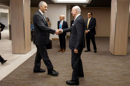 Bashar al-Jaafari, Syrian chief negotiator and Ambassador of the Permanent Representative Mission of the Syria to UN New York, shakes hands with UN Special Envoy of the Secretary-General for Syria Staffan de Mistura (R) prior a round of negotiation, during the Intra Syria talks, at the European headquarters of the United Nations in Geneva, Switzerland, March 3, 2017. REUTERS/Salvatore Di Nolfi/Pool