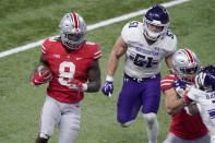 Ohio State running back Trey Sermon (8) runs for the end zone to score past Northwestern linebacker Blake Gallagher (51) during the second half of the Big Ten championship NCAA college football game, Saturday, Dec. 19, 2020, in Indianapolis. (AP Photo/Darron Cummings)