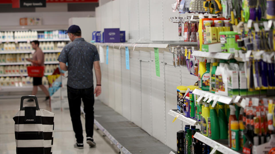 Empty toilet paper shelves at Coles supermarket in Adelaide, Friday, March 13, 2020