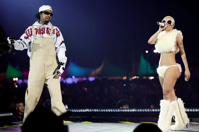 <p>Arturo Holmes/Getty</p> Doja Cat and 21 Savage perform at Coachella 2024