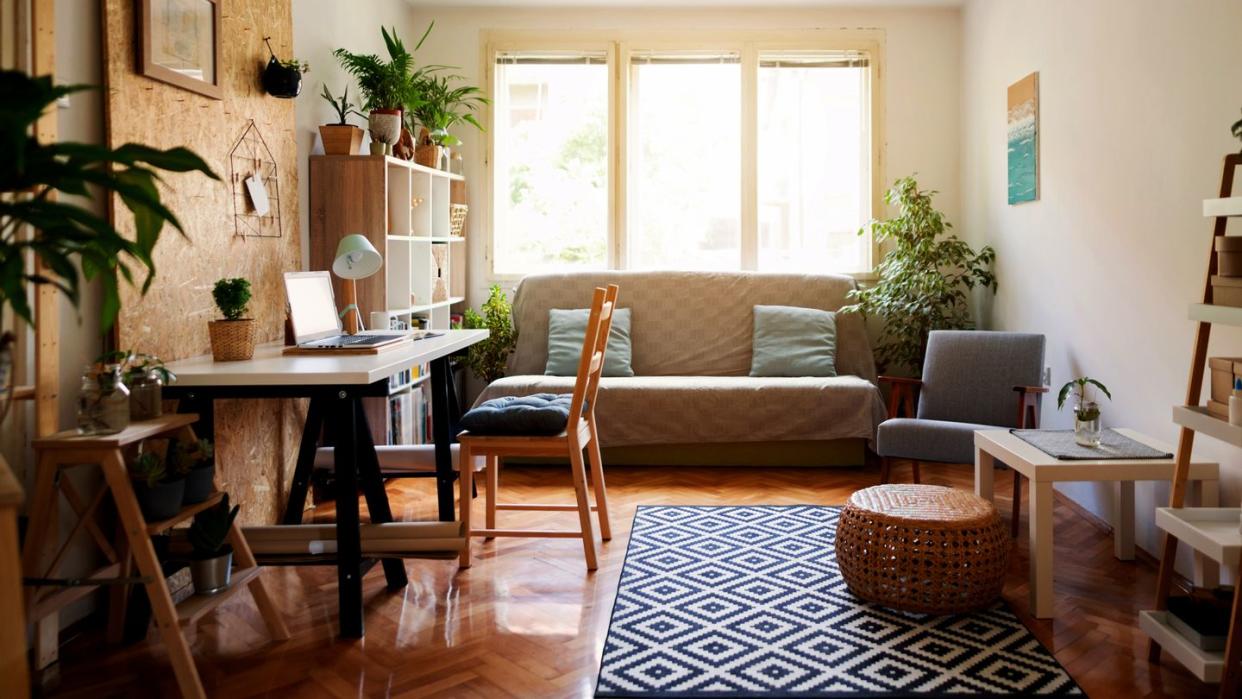 a living room with a couch and a table