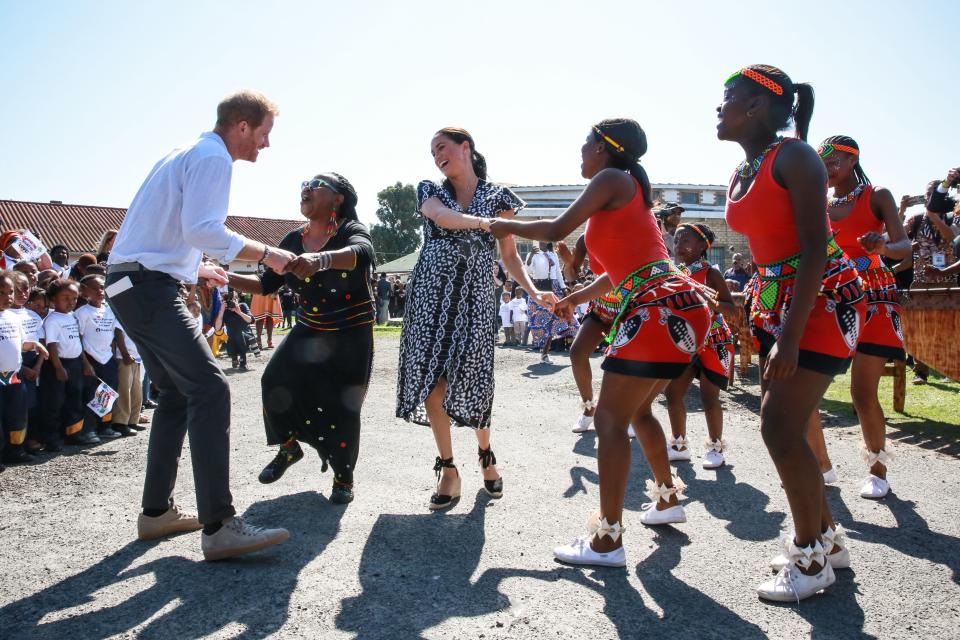 Harry Meghan Markle dance on $450k African tour