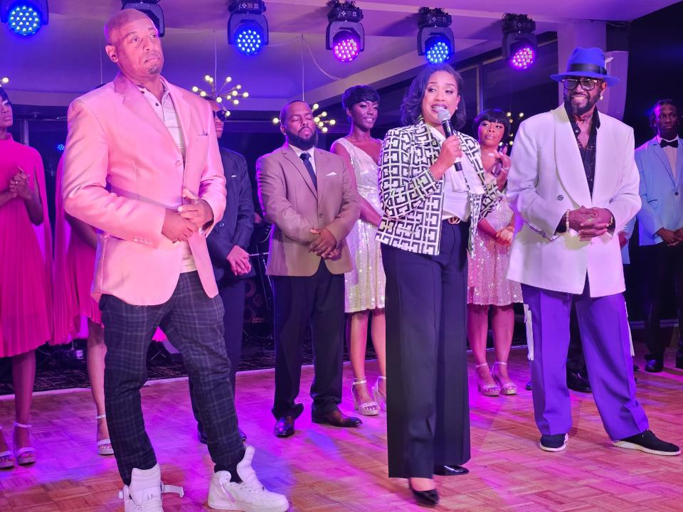 Motown Museum chairwoman and CEO Robin Terry, center, is joined onstage by Otis Williams of the Temptations, right, and Duke Fakir Jr. during a donor event at the Roostertail in Detroit on Oct. 4, 2023.