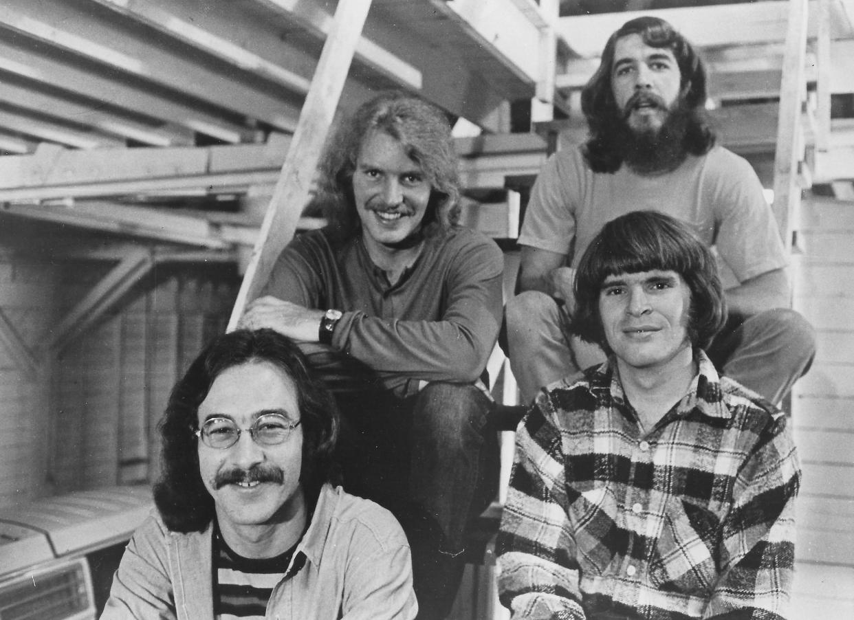 Creedence Clearwater Revival, featuring Stu Cook, Tom Fogerty, Doug Clifford and John Fogerty, takes a publicity photo circa 1969.