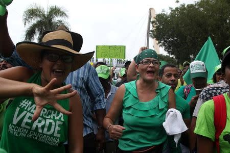 People march during a protest against corruption and the Brazilian conglomerate Odebrecht SA, in Santo Domingo, Dominican Republic, July 16, 2017. REUTERS/Ricardo Rojas