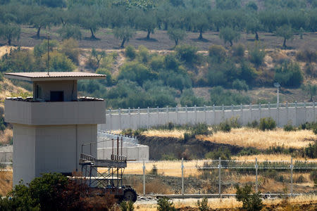 A wall along the border between Turkey and Syria is pictured near the southeastern town of Deliosman in Kilis province, Turkey, August 29, 2016. REUTERS/Umit Bektas/File Photo