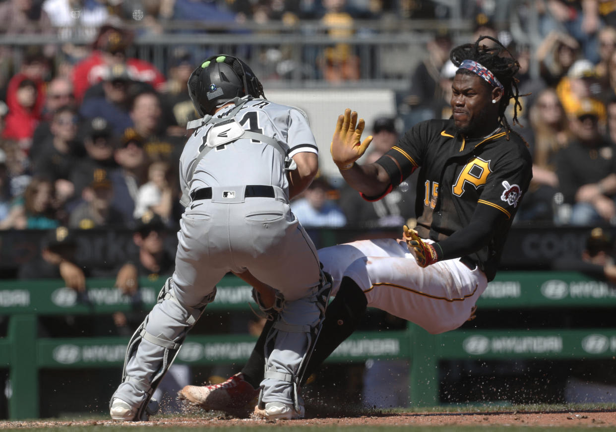 Apr 9, 2023; Pittsburgh, Pennsylvania, USA; Chicago White Sox catcher Seby Zavala (44) tags Pittsburgh Pirates shortstop Oneil Cruz (15) out at home plate attempting to score during the sixth inning at PNC Park. Cruz suffered an apparent injury on the play and left the game. Mandatory Credit: Charles LeClaire-USA TODAY Sports