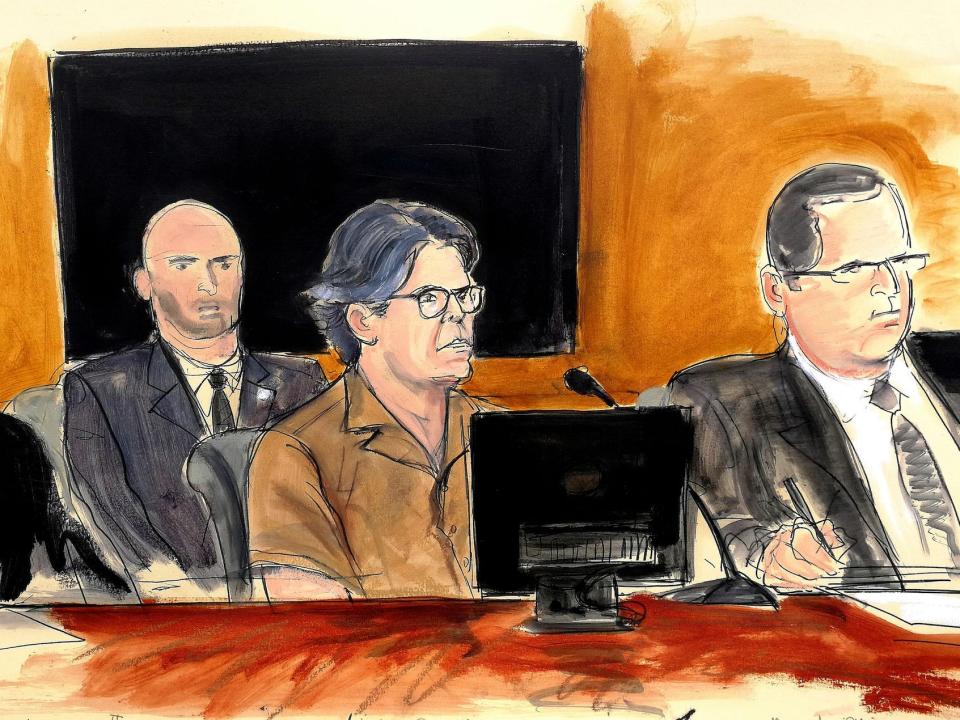 In this courtroom sketch Keith Raniere, second from right, leader of the secretive group NXIVM, attends a court hearing Friday, April 13, 2018.