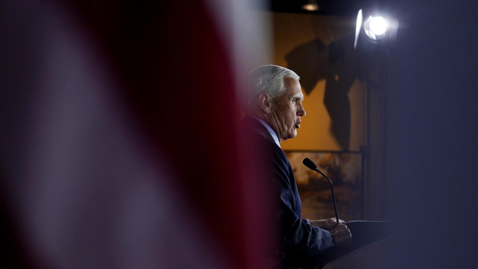 Former Vice President Mike Pence addresses a gathering, Wednesday, Dec. 8, 2021, in Manchester, N.H. (AP Photo/Charles Krupa)