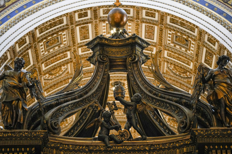 A view of the top part of the 17th century, 95ft-tall bronze canopy by Giovan Lorenzo Bernini surmounting the papal Altar of the Confession in St. Peter's Basilica at the Vatican, Wednesday, Jan. 10, 2024. Vatican officials unveiled plans Thursday, Jan.11, for a year-long, 700,000 euro restoration of the monumental baldacchino, or canopy, of St. Peter's Basilica, pledging to complete the first comprehensive work on Bernini's masterpiece in 250 years before Pope Francis' big 2025 Jubilee. (AP Photo/Andrew Medichini)