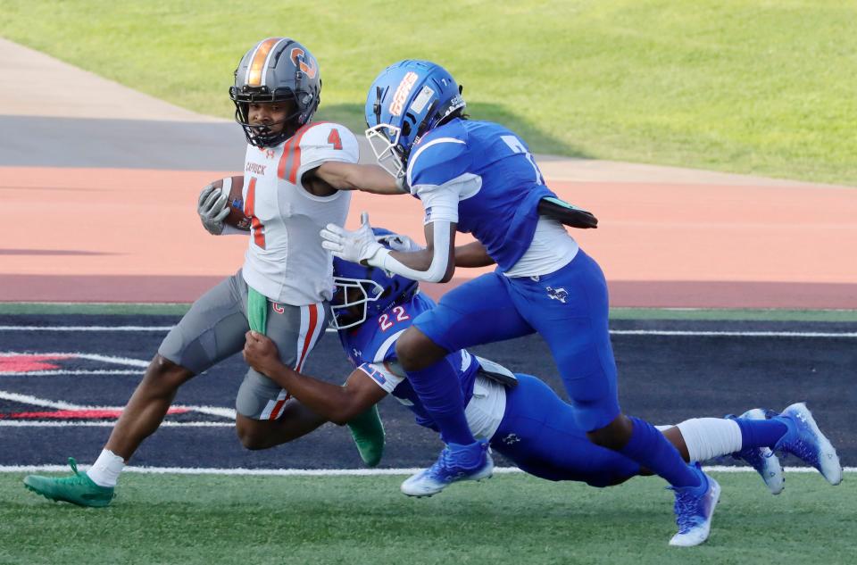 Caprock's Zy'Quavion Smith (4) gets tackled by Palo Duro, Thursday, Sept. 1, 2022, at Dick Bivins Stadium.