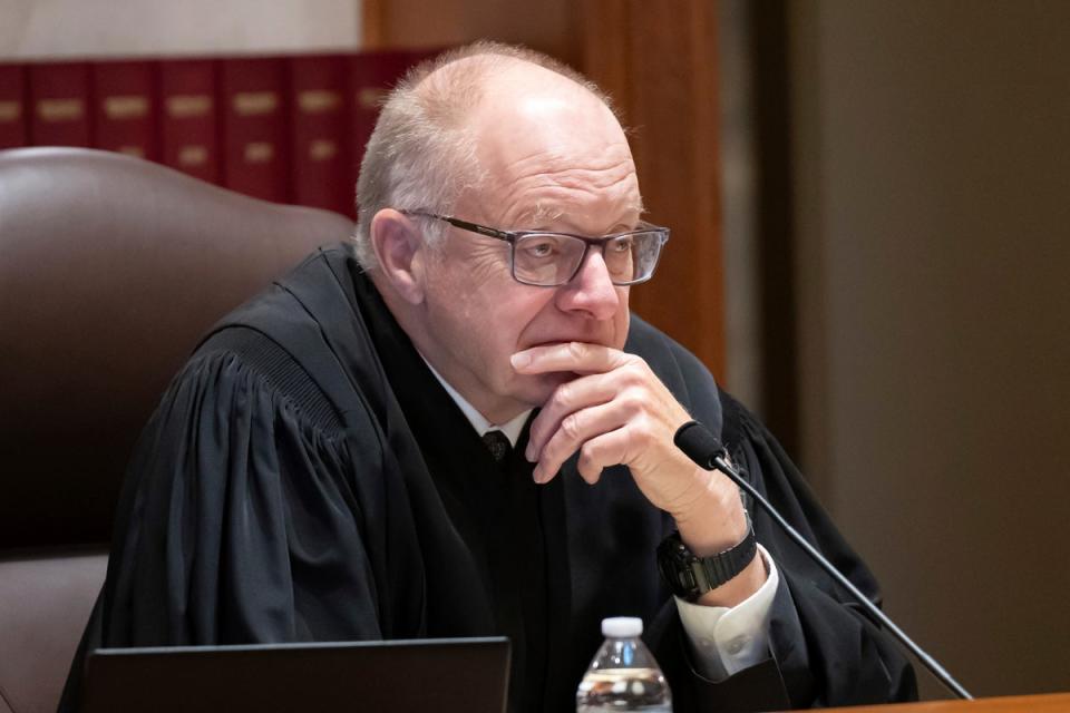 Associate Justice Barry Anderson listens as Donald Trump's attorney Nicholas Nelson argues his case before the Minnesota Supreme Court (AP)