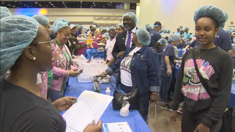 Many families honored Dr. Martin Luther King Jr. by helping others at the Orange County Convention Center.