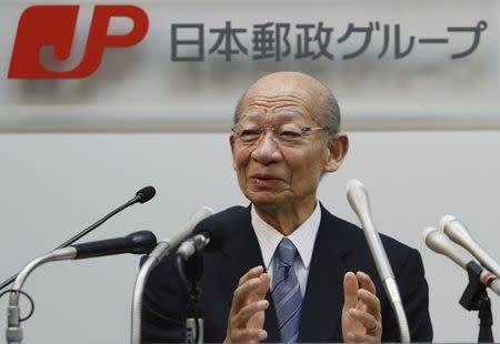 Taizo Nishimuro, president of Japan Post Holdings Co., speaks during a news conference at its headquarters in Tokyo February 18, 2015. REUTERS/Yuya Shino