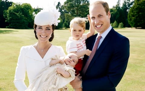 The Duke and Duchess of Cambridge and their children, Prince George and Princess Charlotte who was christened at Sandringham  - Credit: Mario Testino / Art Partner/PA