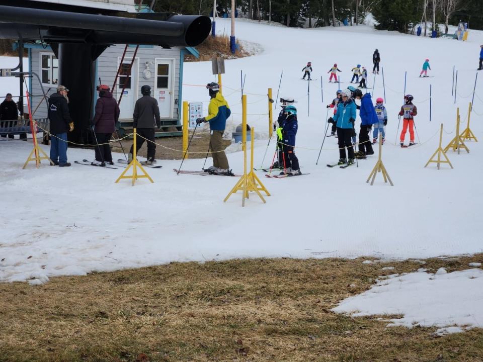 Skiers line up for the chair lift at Ski Martock in Windsor, N.S. (Jeremy Hull - image credit)