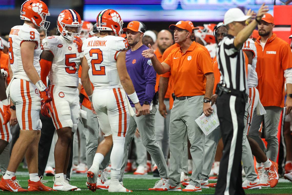 Aug 31, 2024; Atlanta, Georgia, USA; Clemson Tigers quarterback Cade Klubnik (2) talks to head coach Dabo Swinney against the Georgia Bulldogs in the second quarter at Mercedes-Benz Stadium. Mandatory Credit: Brett Davis-USA TODAY Sports Brett Davis/Brett Davis-USA TODAY Sports