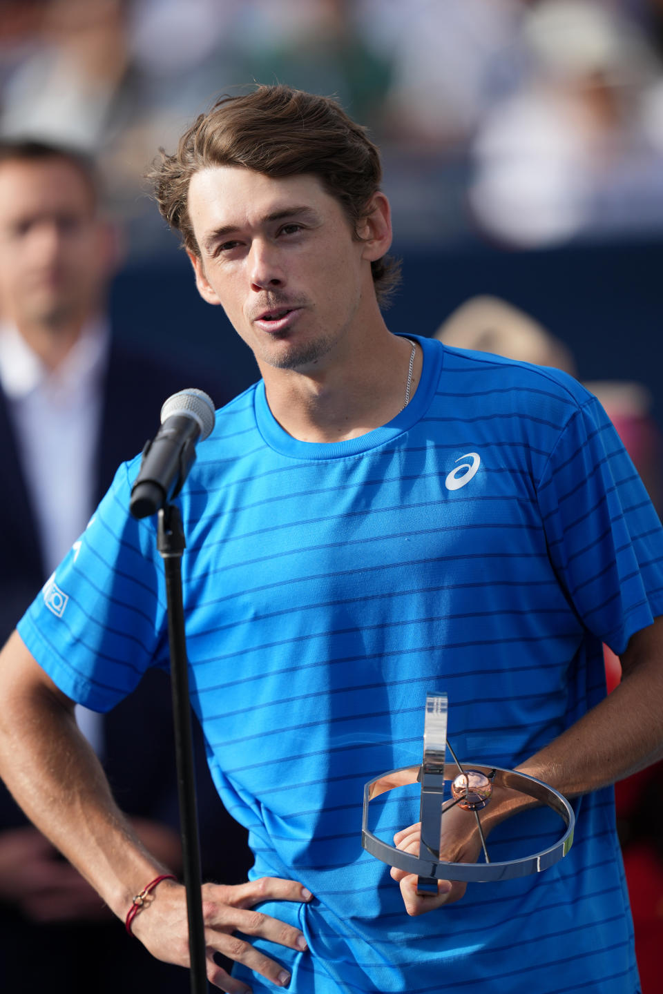 Alex De Minaur speaks after a match.