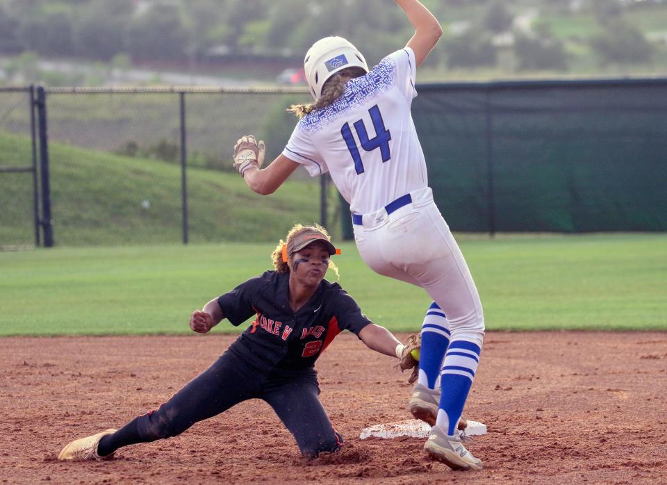 Lake Wales shortstop Zamya McBurrows tags out Deltona's Adrianna Stump in the Class 4A state championshipp softball game at Legends Way Ballfields in Clermont.
