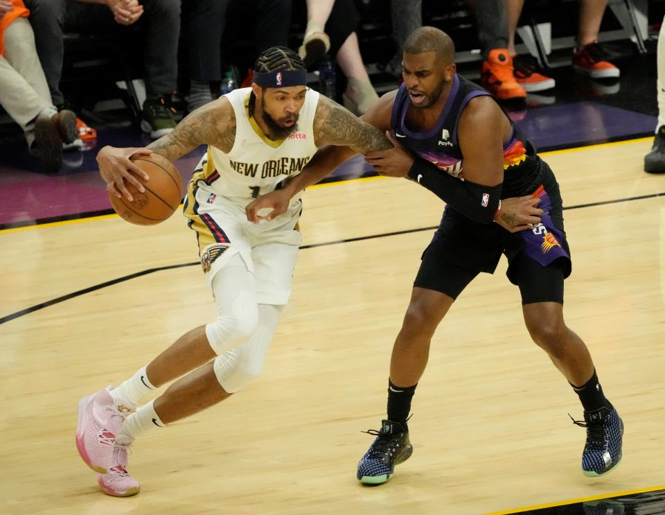 Apr 19, 2022; Phoenix, Arizona, U.S.;  Phoenix Suns guard Chris Paul (3) defends New Orleans Pelicans forward Brandon Ingram (14) during Game 2 of the Western Conference playoffs.