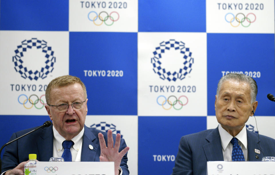 John Coates, left, chairman of the IOC Coordination Commission for the 2020 Tokyo Olympics and Paralympics and Tokyo Olympic organizing committee President Yoshiro Mori attend the IOC and Tokyo 2020 joint press conference Wednesday, Sept. 12, 2018. (AP Photo/Eugene Hoshiko)