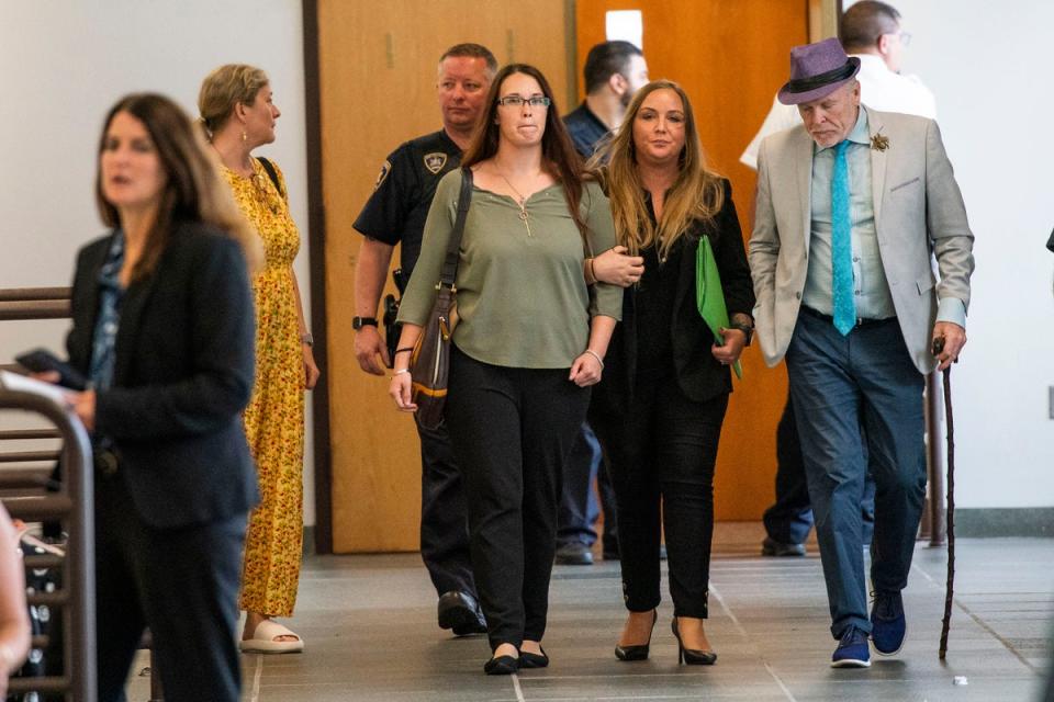 Families of victims leave court after Rex Heuermann’s initial court appearance (Copyright 2023 The Associated Press. All rights reserved.)