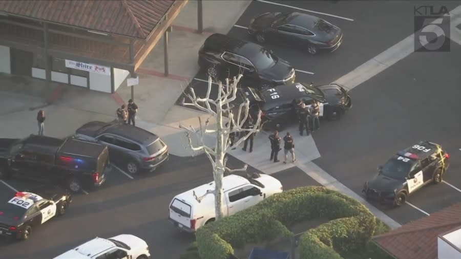 A suspect was killed after a bomb threat prompted the evacuation of a Fullerton bank on March 26, 2024. (KTLA)