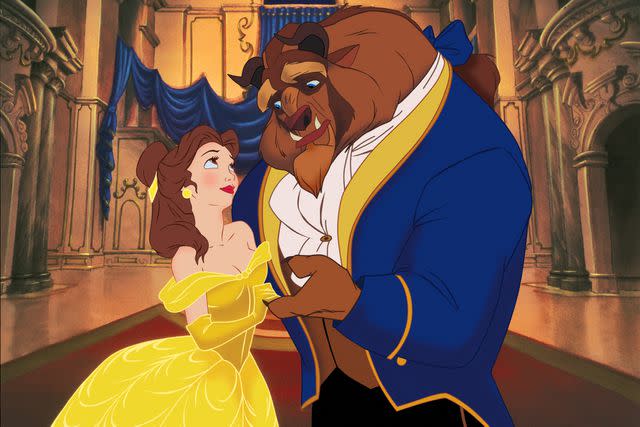 Walt Disney Pictures/courtesy Everett Collection Belle (voiced by Paige O'Hara) and the Beast (voiced by Robby Benson) in 'Beauty and the Beast'