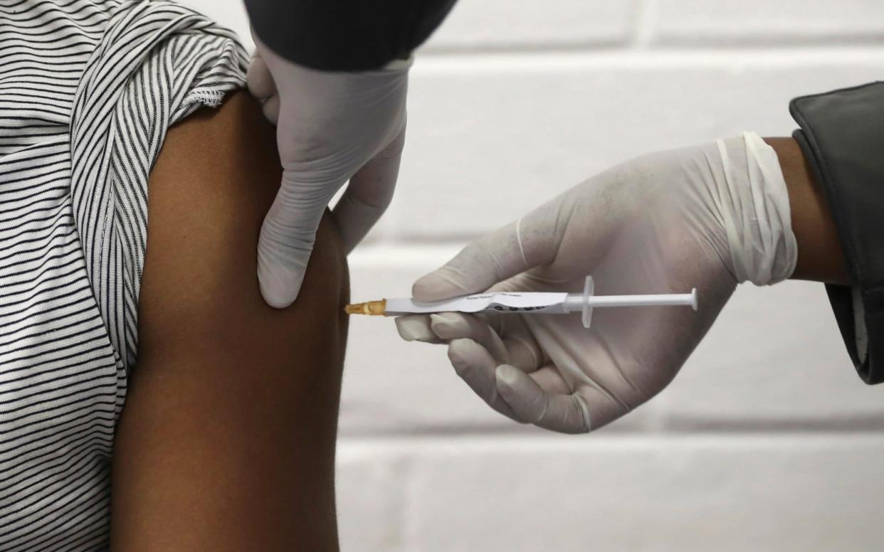 A volunteer receives a vaccine - Siphiwe Sibeko /POOL Reuters 