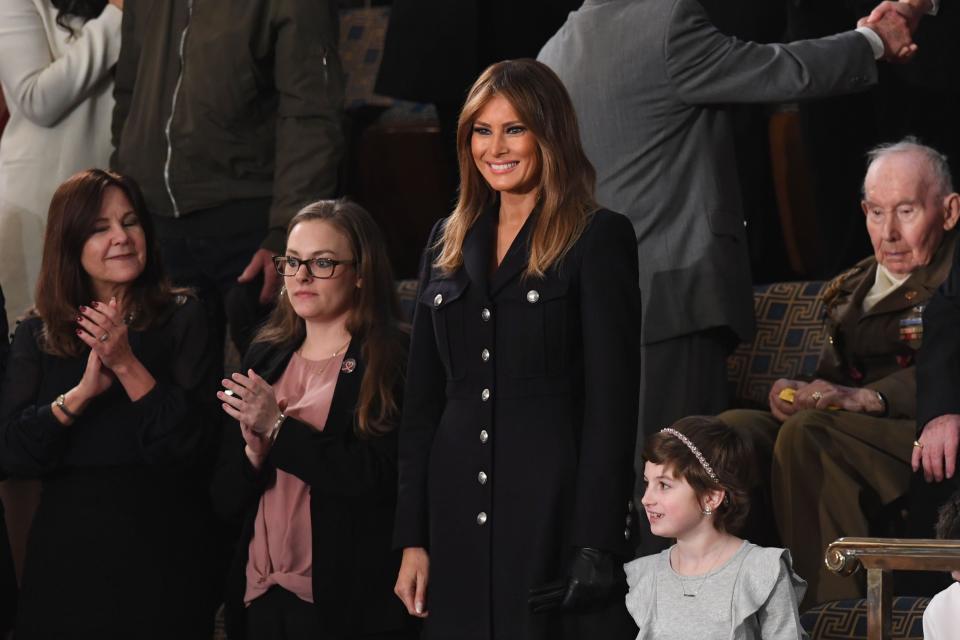 Melania opted for a black Burberry trench dress for the 2019 SOTUAFP via Getty Images