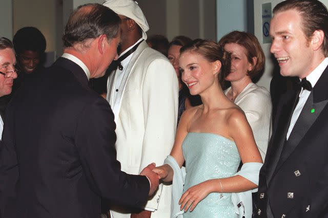 <p>Anwar Hussein/Getty </p> King Charles (then Prince Charles), Natalie Portman and Ewan McGregor on July 14, 1999