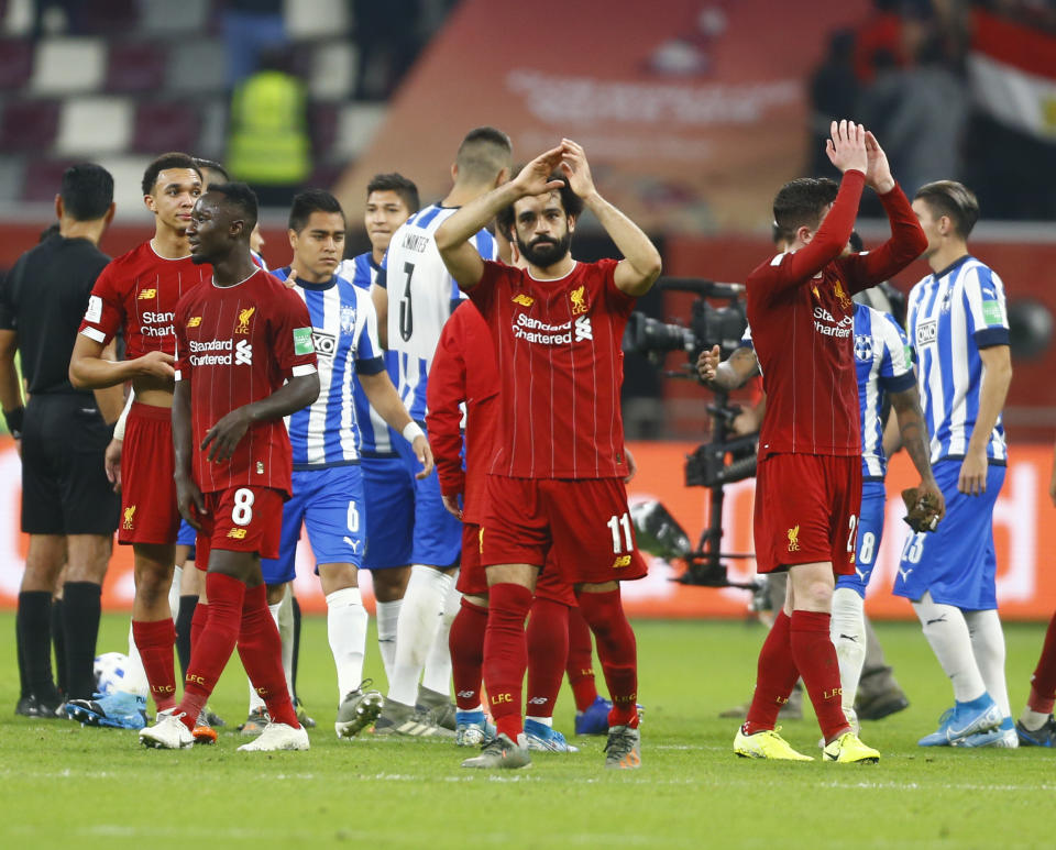 Jugadores del Liverpool festejan después de anotar un gol frente a los Rayados de Monterrey en duelo de las semifinales del Mundial de Clubes en el Estadio Internacional Jalifa de Doha, Qatar, el miércoles 18 de diciembre de 2019. (AP Foto/Hussein Sayed)