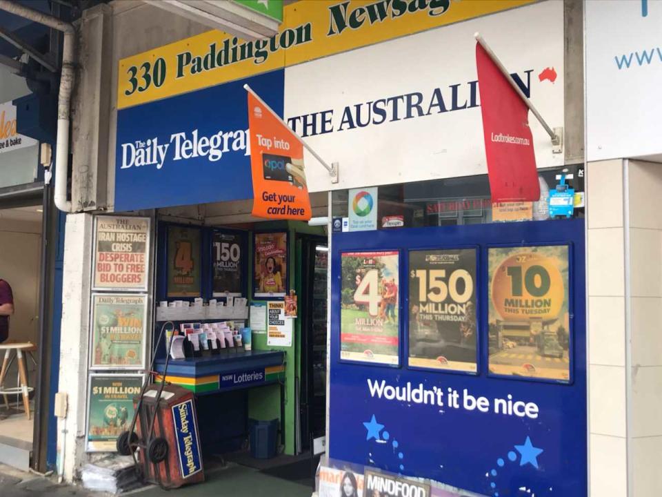 A Sydney newsagent displaying a poster for tonight's $150 million draw.