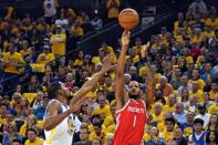 May 26, 2018; Oakland, CA, USA; Houston Rockets forward Trevor Ariza (1) shoots the ball against Golden State Warriors forward Kevin Durant (35) during the first quarter in game six of the Western conference finals of the 2018 NBA Playoffs at Oracle Arena. Mandatory Credit: Kyle Terada-USA TODAY Sports