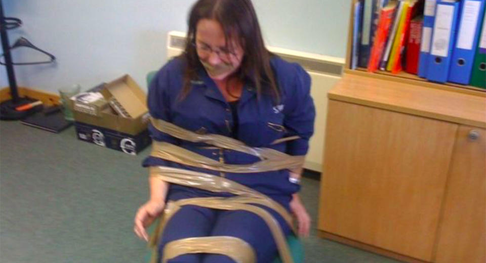 DeeAnn Fitzpatrick was pictured tied up and gagged after reportedly complaining about the men at her workplace (BBC)