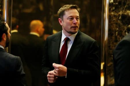 Tesla Chief Executive, Elon Musk enters the lobby of Trump Tower in Manhattan, New York, U.S., January 6, 2017. REUTERS/Shannon Stapleton/File Photo