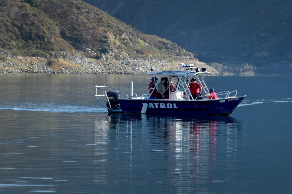 Search and Rescue teams use boats to look along the northern shore of Lake Piru on Thursday, July 9, 2020, for actress Naya Rivera. The "Glee" actress went missing after renting a boat with her 4-year-old son at Lake Piru on Wednesday.