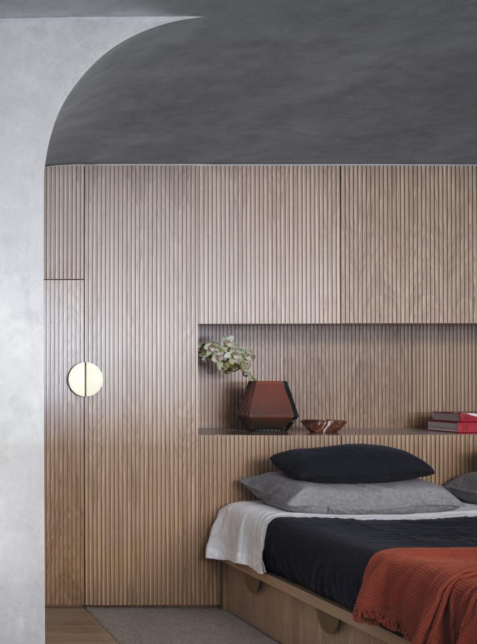 <p>Built-in storage above the bed went out of fashion years ago – its often the first thing to go when new buyers arrive – but thanks to attractive bespoke cabinetry like this stylish example in a Sydney home by Killing Matt Woods, it’s enjoying a renaissance. An inset shelf also eliminates the need for bedside tables, reducing visual clutter and maximising floor space. </p>