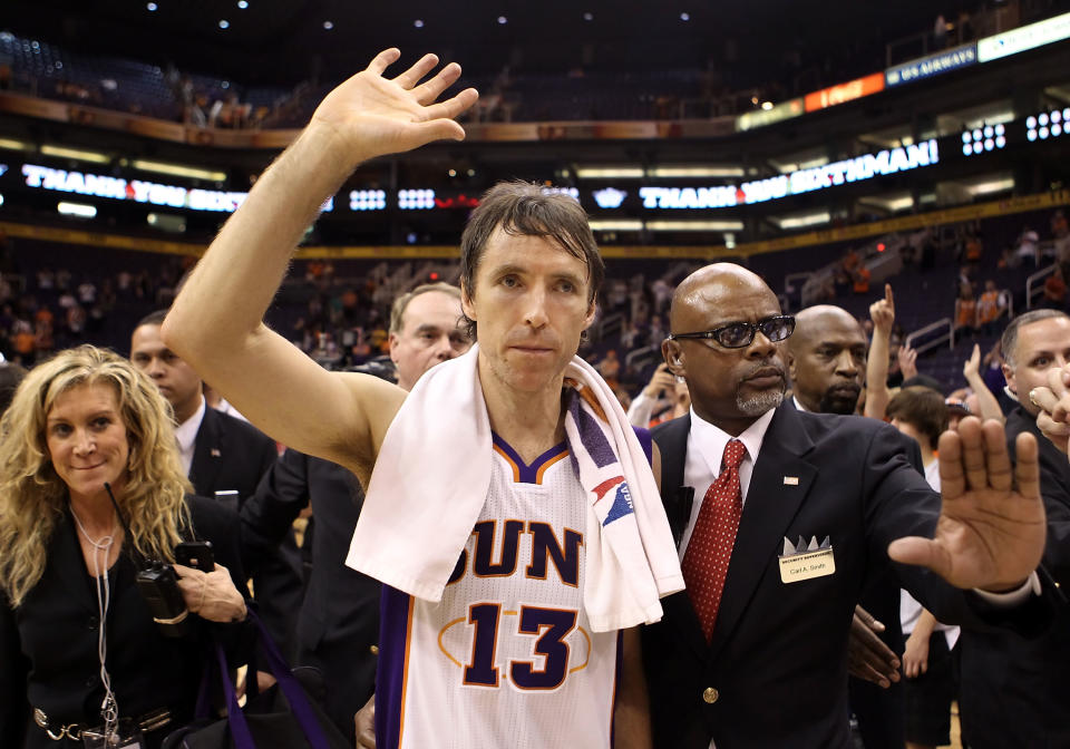 PHOENIX, AZ - APRIL 25: Steve Nash #13 of the Phoenix Suns waves to fans as he walks off the court following the NBA game against the San Antonio Spurs at US Airways Center on April 25, 2012 in Phoenix, Arizona. The Spurs defeated the Suns 110-106. NOTE TO USER: User expressly acknowledges and agrees that, by downloading and or using this photograph, User is consenting to the terms and conditions of the Getty Images License Agreement. (Photo by Christian Petersen/Getty Images)