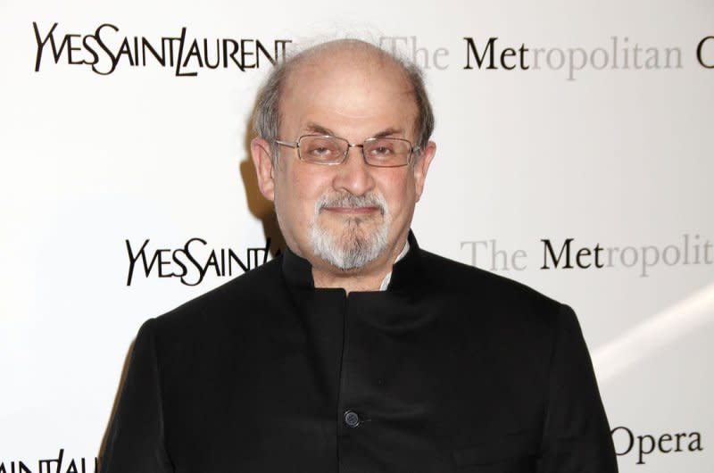 Salman Rushdie arrives for the Metropolitan Opera's Premiere of Jules Massemet's "Manon" at the Metropolitan Opera House at Lincoln Center in New York on March 26, 2012. In 1989, Iranian leader Ayatollah Khomeini, offended by Rushdie's "The Satanic Verses," called on Muslims to kill the author. File Photo by Laura Cavanaugh/UPI