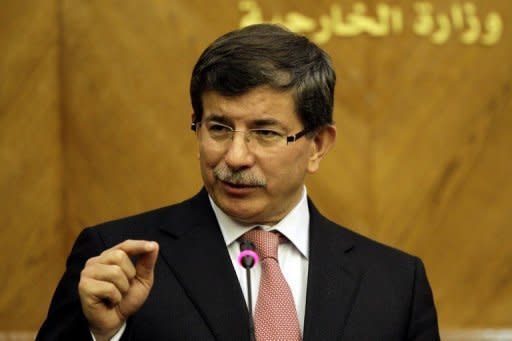Turkey on Sunday called on the international community for a united response to stop the bloodshed in Syria and summoned the Syrian envoy to condemn attacks on its diplomatic missions by pro-regime protesters. Turkish Foreign Minister Ahmet Davutoglu (seen here in Amman in October) is to meet representatives of the Syrian opposition movement in Ankara at 1800 GMT Sunday, his ministry said