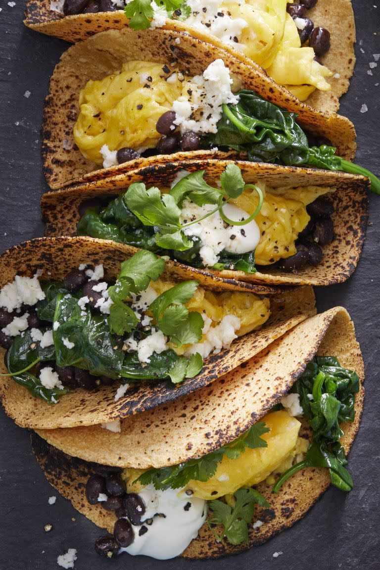<p>Breakfast for dinner? Yes, please! These egg and bean-filled tacos are packed with healthy protein, and will keep you feeling full all night long. Feel free to top them off with your favorite veggies for some extra nutritional value.</p><p><a href="https://www.womansday.com/food-recipes/food-drinks/a16764124/scrambled-egg-tacos-recipe/" rel="nofollow noopener" target="_blank" data-ylk="slk:Get the Scrambled Egg Tacos recipe.;elm:context_link;itc:0;sec:content-canvas" class="link "><em>Get the Scrambled Egg Tacos recipe.</em></a><br></p>