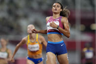 Sydney Mclaughlin, of the United States, competes in a semifinal of the women's 400-meter hurdles at the 2020 Summer Olympics, Monday, Aug. 2, 2021, in Tokyo. (AP Photo/Petr David Josek)