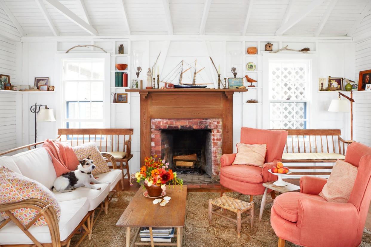 casual coastal living room with coral colored upholstery