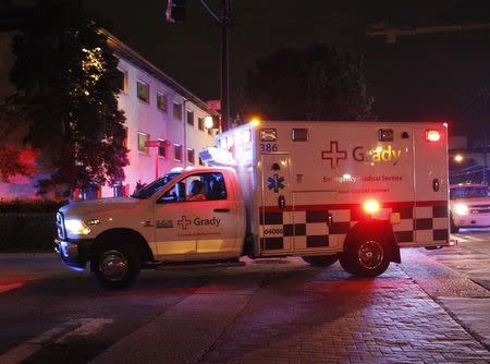 An ambulance transporting Amber Joy Vinson arrives at Emory University Hospital in Atlanta, Georgia October 15, 2014. REUTERS/Tami Chappell