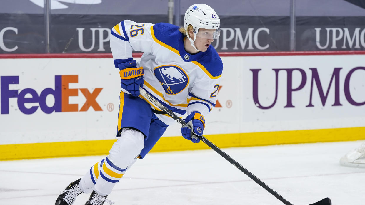 PITTSBURGH, PA - MARCH 25: Buffalo Sabres Defenseman Rasmus Dahlin (26) skates with the puck during the second period in the NHL game between the Pittsburgh Penguins and the Buffalo Sabres on March 25, 2021, at PPG Paints Arena in Pittsburgh, PA. (Photo by Jeanine Leech/Icon Sportswire via Getty Images)